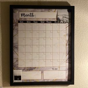 This is a Marble calendar! In great condition and brand new.